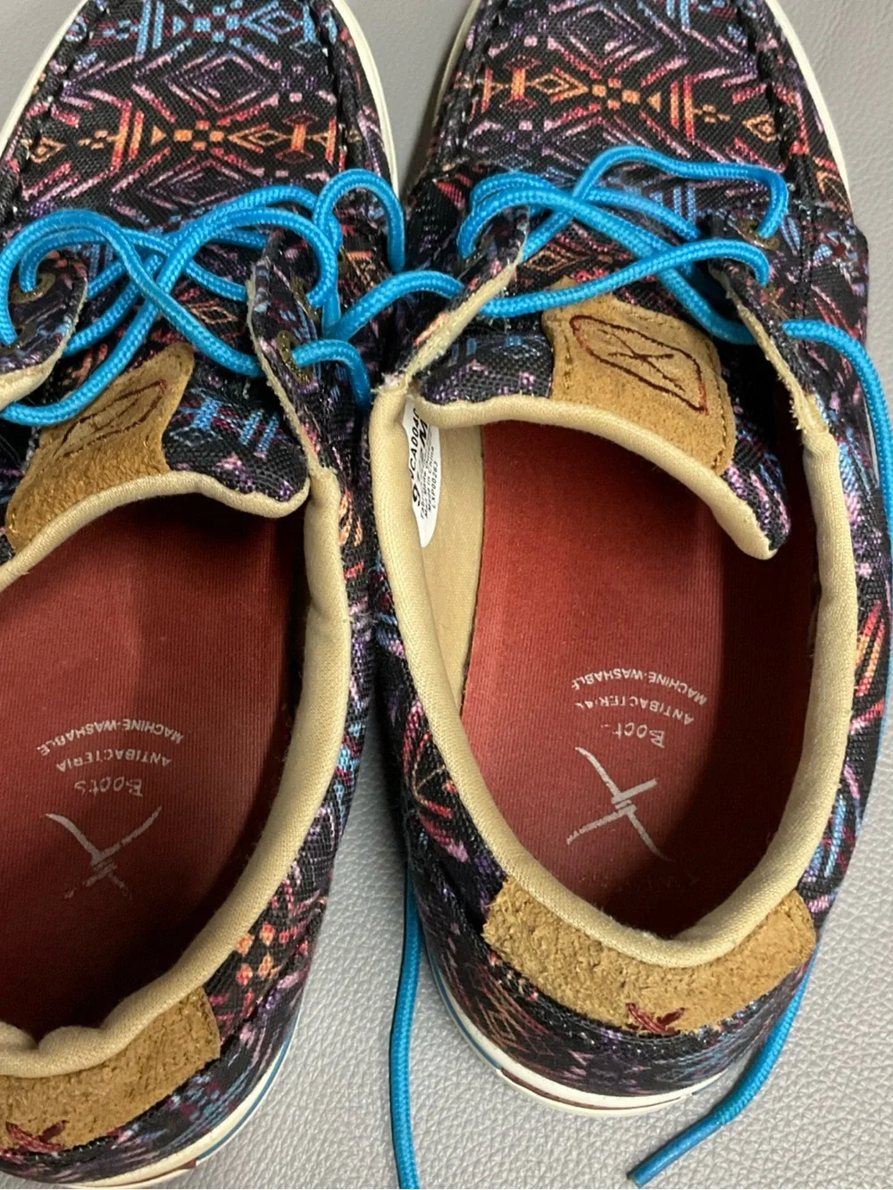 Twisted X Men’s Black Aztec-Print Boat Shoes with Bright Blue Laces